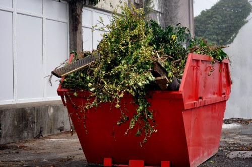 Waste truck being inspected for safe operation before departure